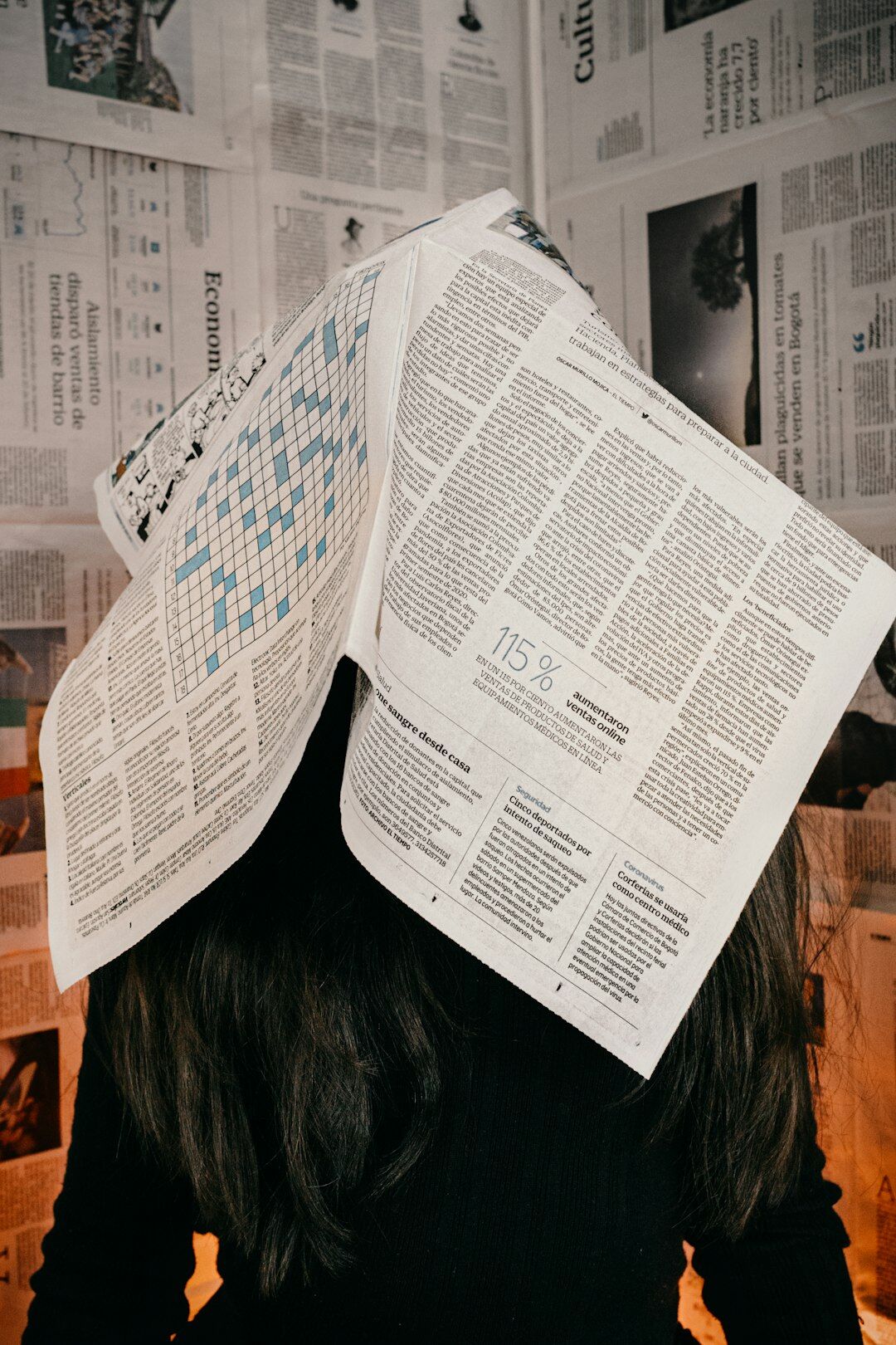 person reading newspaper