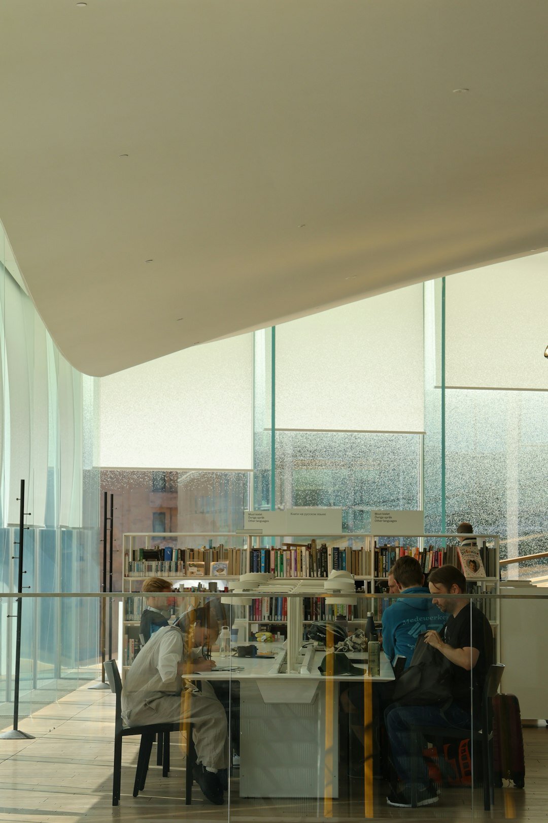 Researchers working in a bright open-plan institute office